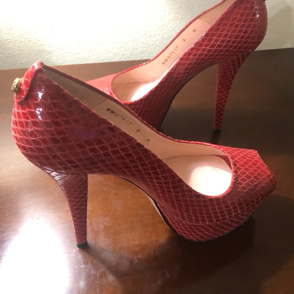 Stuart weltzman women’s heels.
